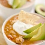 Pressure Cooker Chicken Tortilla Soup is a quick and easy soup recipe made in your Instant Pot that is bursting with bold and spicy flavors!