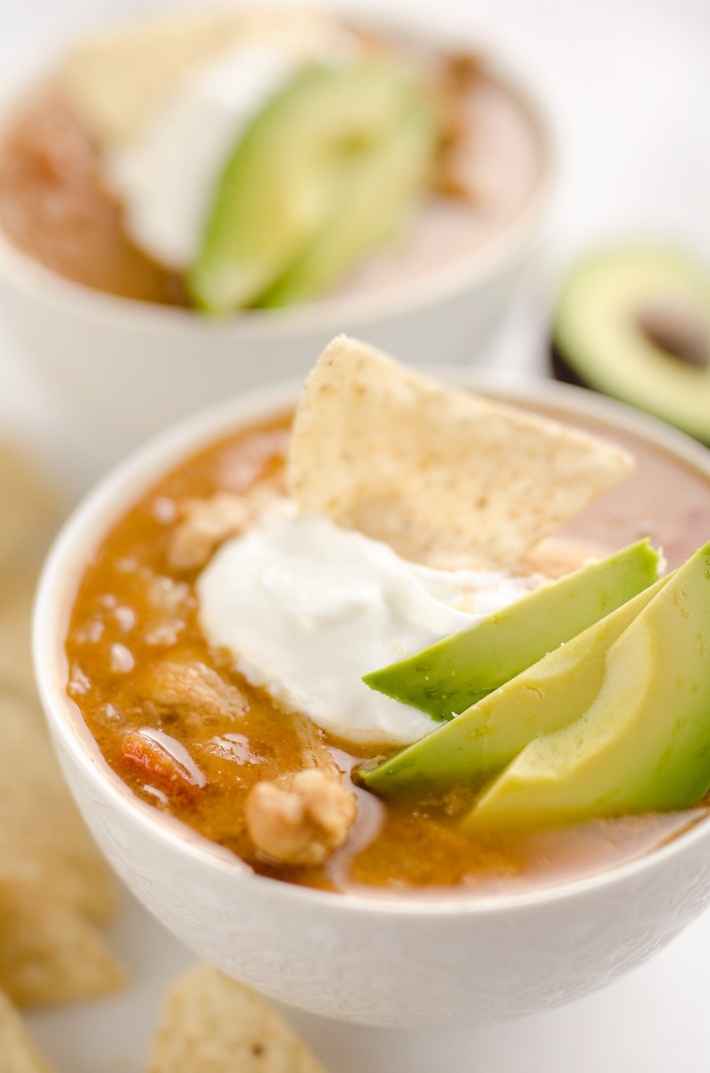 Pressure Cooker Chicken Tortilla Soup is a quick and easy soup recipe made in your Instant Pot that is bursting with bold and spicy flavors!