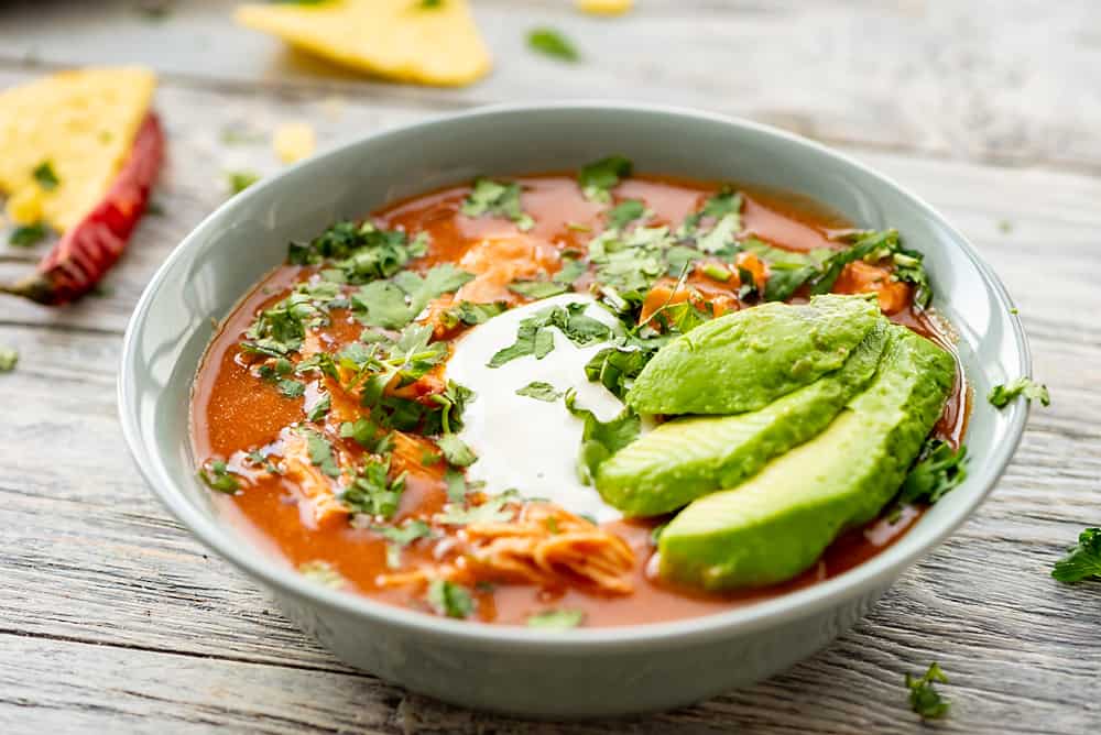 Pressure Cooker Chicken Tortilla Soup on table with chips