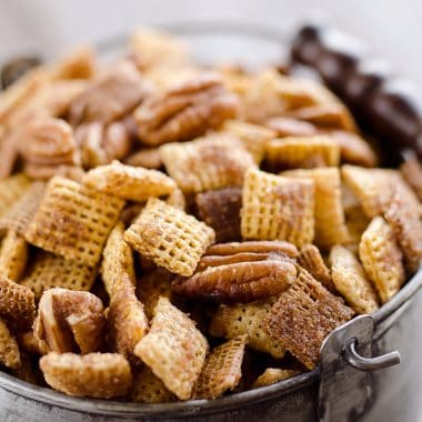 Sweet & Spicy Pecan Snack Mix is a delicious treat with Chex coated in a spicy cinnamon brown sugar mixture and tossed with pecans. This delicious Chex Mix will disappear quickly at your next holiday gathering!