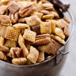 Sweet & Spicy Pecan Snack Mix is a delicious treat with Chex coated in a spicy cinnamon brown sugar mixture and tossed with pecans. This delicious Chex Mix will disappear quickly at your next holiday gathering!