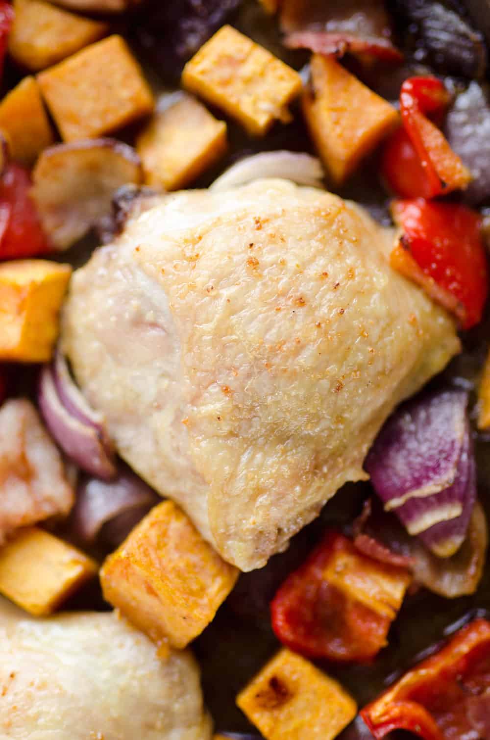 Harvest Chicken Sheet Pan Dinner is an easy and healthy dinner with chicken thighs and roasted vegetables that will come together in no time!