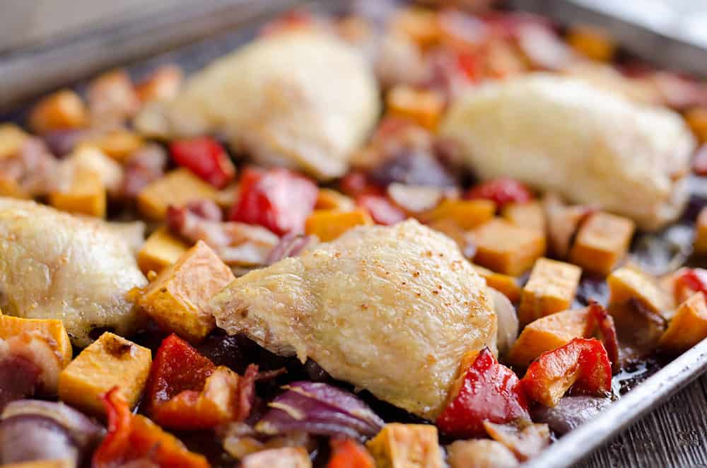 Harvest Chicken Sheet Pan Dinner is an easy and healthy dinner with chicken thighs and roasted vegetables that will come together in no time!