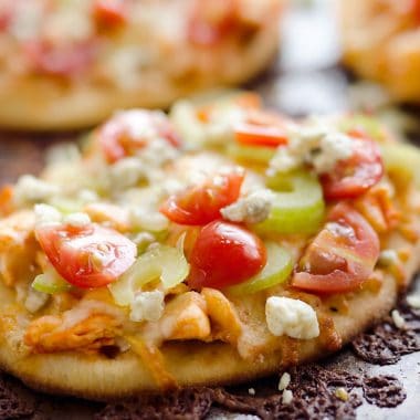 Mini Buffalo Turkey Pizzas are an easy and flavorful way to use up leftover turkey for a quick and delicious dinner idea or crowd pleasing finger food for game day!