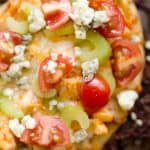 Mini Buffalo Turkey Pizzas are an easy and flavorful way to use up leftover turkey for a quick and delicious dinner idea or crowd pleasing finger food for game day!