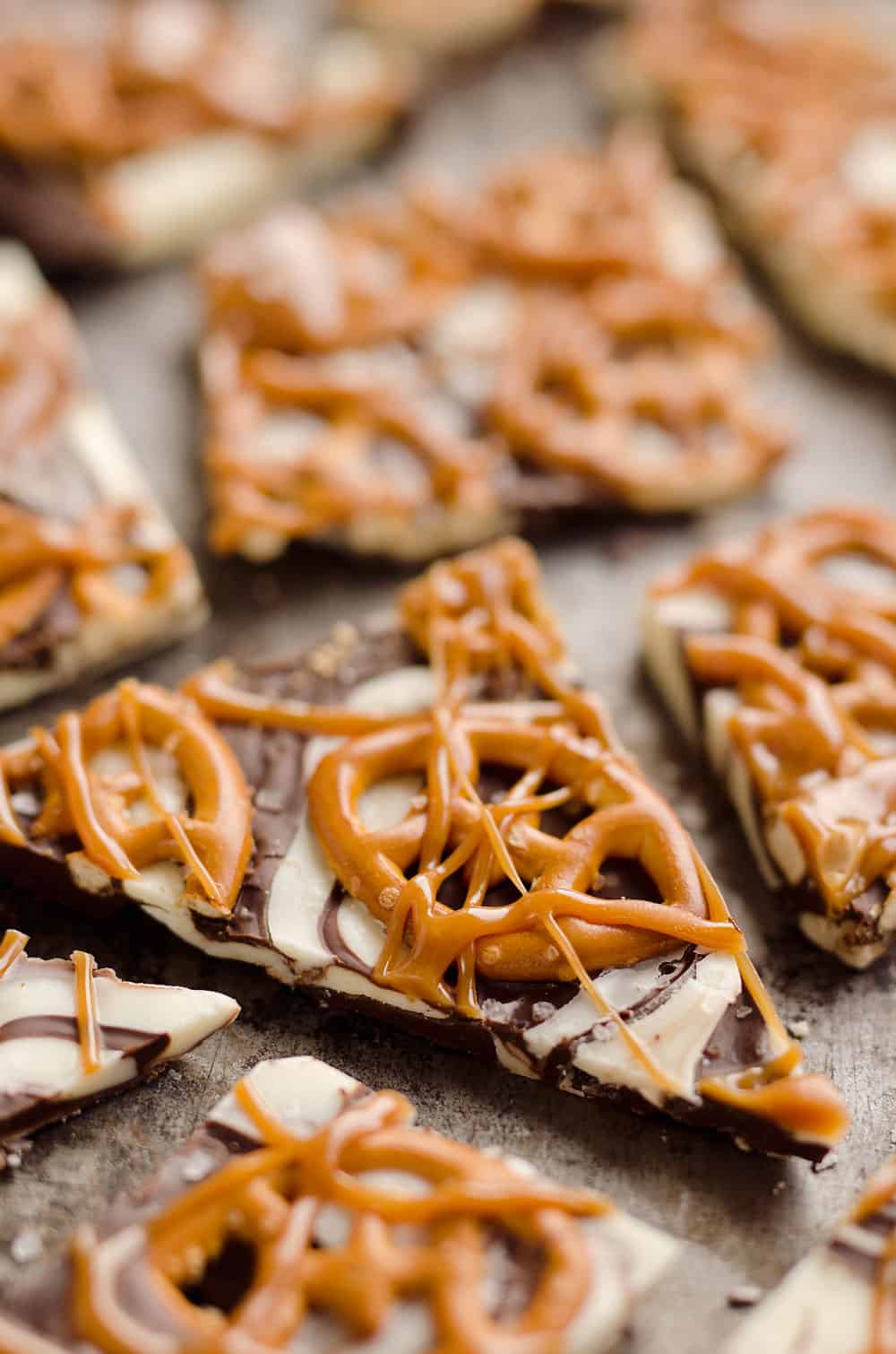 Salted Caramel & Pretzel Chocolate Bark is an easy and delicious sweet & salty dessert to add to your next party snack table! It's perfect for a game day sweet while watching football or a holiday treat. 