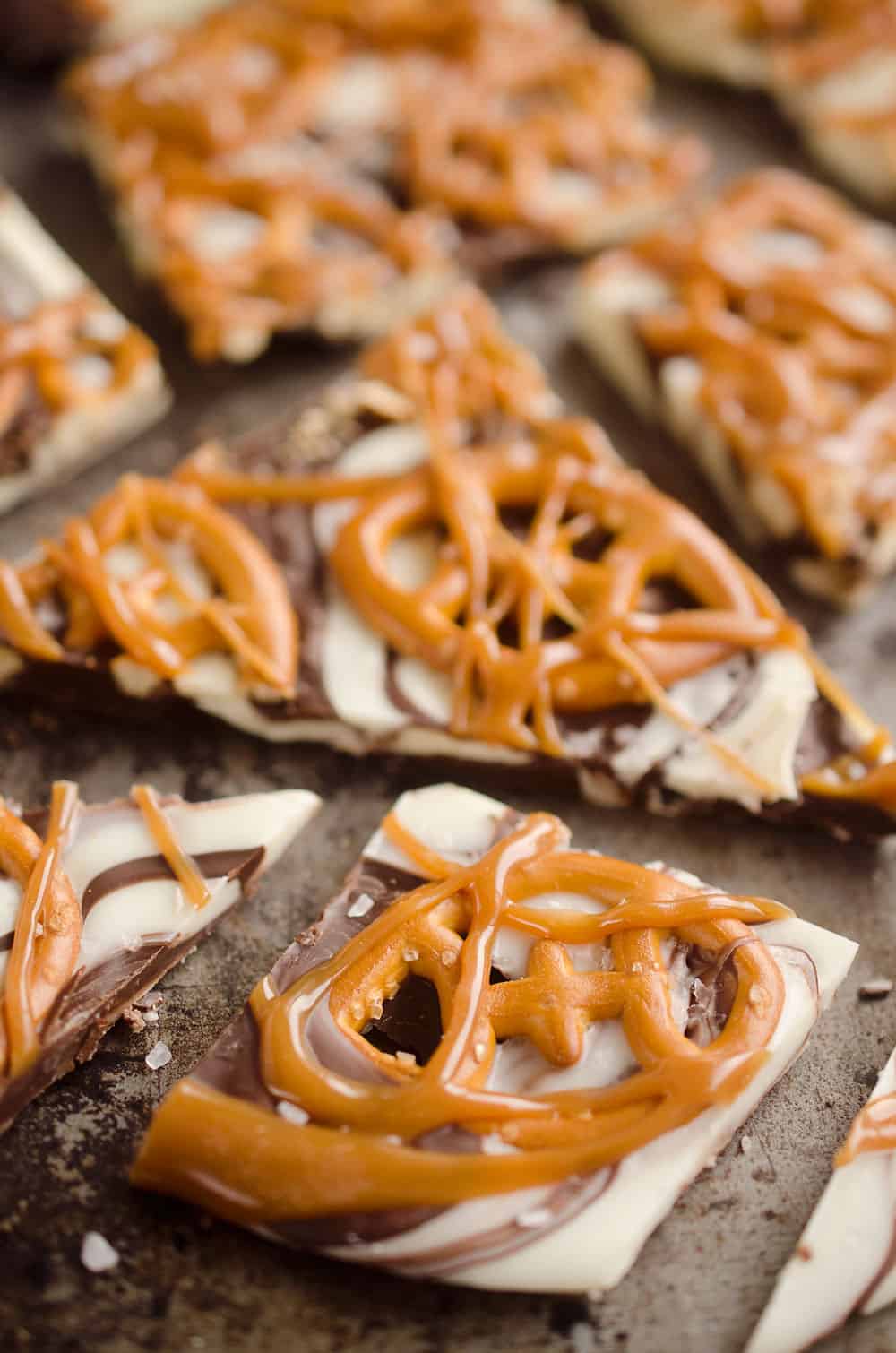 Salted Caramel & Pretzel Chocolate Bark is an easy and delicious sweet & salty dessert to add to your next party snack table! It's perfect for a game day sweet while watching football or a holiday treat. 