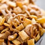 Buffalo Ranch Snack Mix is an easy treat perfect for the big game or holidays. Chex Mix is combined with pretzels and cashews and tossed in a spicy buffalo ranch sauce for a twist on your traditional snack mix.