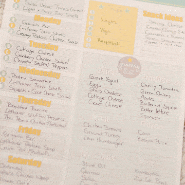 Free Printable Weekly Meal Planner filled out on table with pen