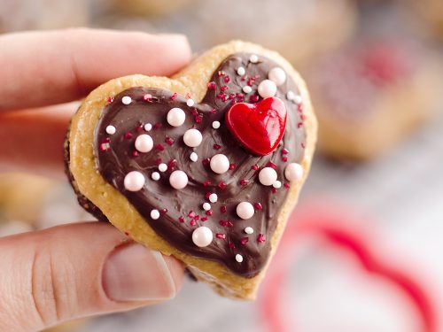 Peanut Butter Buckeye Brownie Hearts are the perfect sweet for your special Valentine. They combine two of the best desserts into one amazing treat with brownies and peanut butter buckeyes!