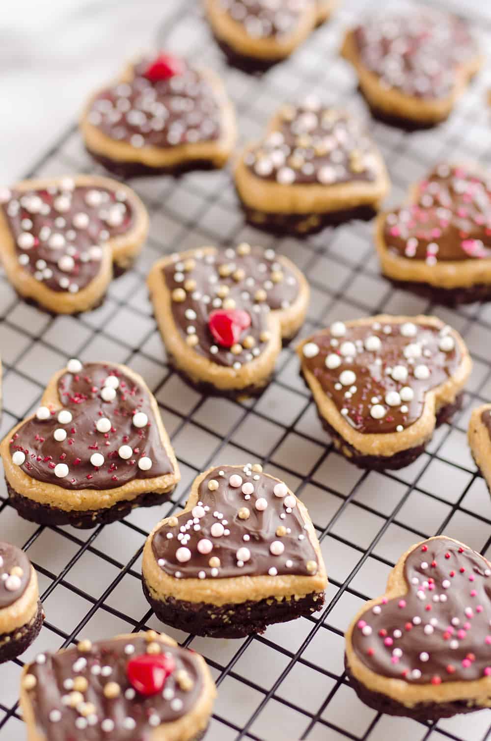 Peanut Butter Buckeye Brownie Hearts are the perfect sweet for your special Valentine. They combine two of the best desserts into one amazing treat with brownies and peanut butter buckeyes!