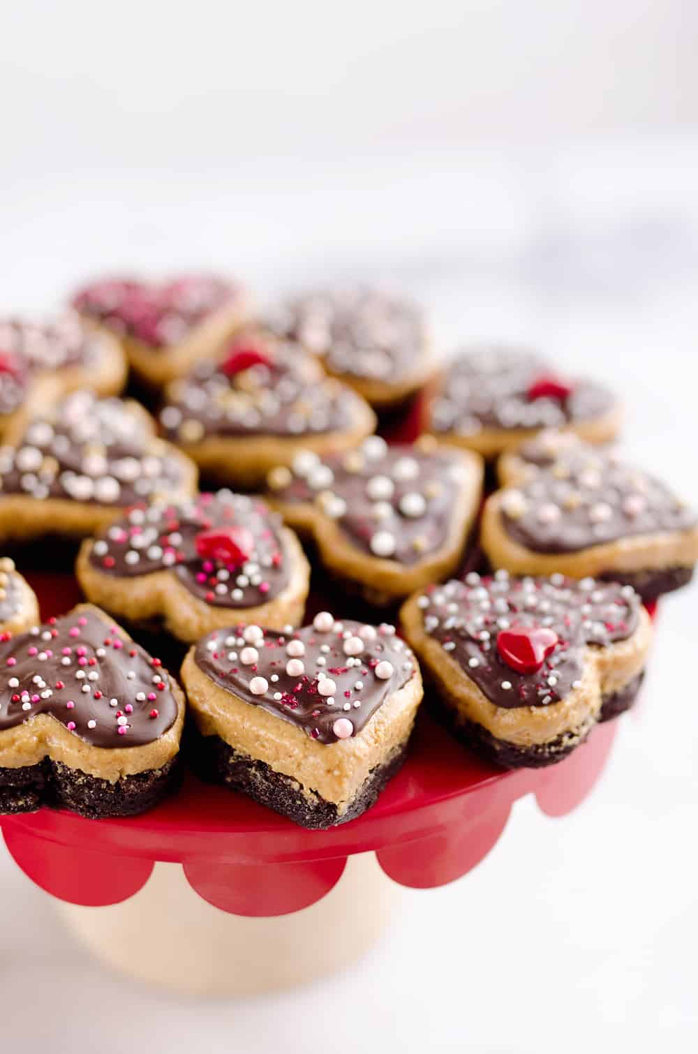 Peanut Butter Buckeye Brownie Hearts are the perfect sweet for your special Valentine. They combine two of the best desserts into one amazing treat with brownies and peanut butter buckeyes!