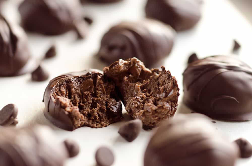 Protein Dark Chocolate Truffles are an easy and delicious treat made with protein powder and dark chocolate peanut butter for a healthy snack that tastes amazingly decadent!