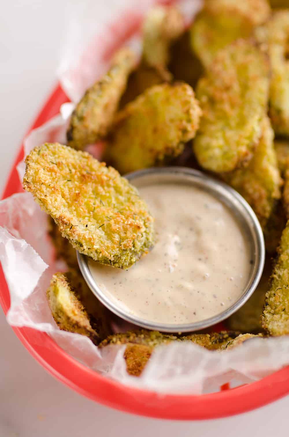 Airfryer Parmesan Dill Fried Pickle Chips are a quick and easy appetizer made extra crunchy in your Airfryer without all the fat from oil. This low-fat snack is sure to satisfy your craving for something salty!