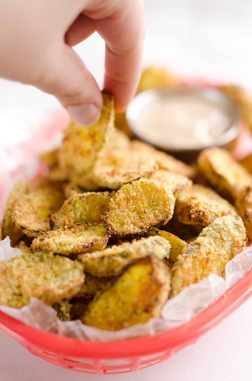 Airfryer Parmesan Dill Fried Pickle Chips are a quick and easy appetizer made extra crunchy in your Airfryer without all the fat from oil. This low-fat snack is sure to satisfy your craving for something salty!