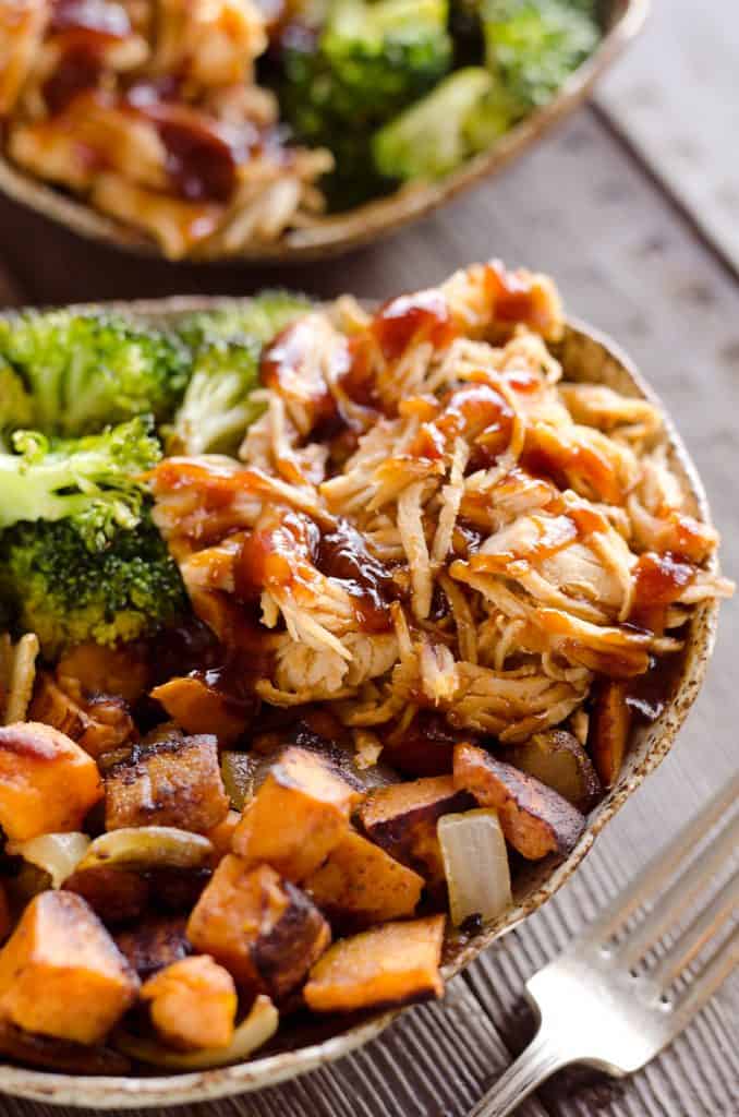 BBQ Chicken & Roasted Sweet Potato Bowls are a hearty and healthy dinner idea bursting with bold flavors and nutritious vegetables. This easy recipe is perfect for meal prepping lunches for work or a quick weeknight meal.