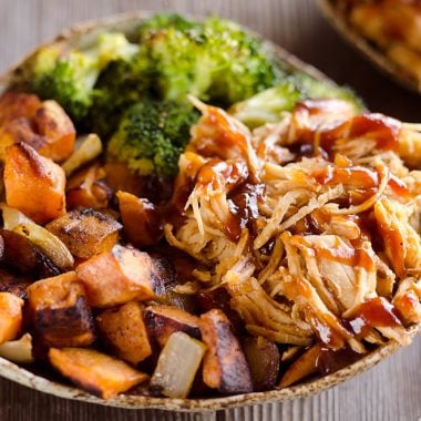 BBQ Chicken & Roasted Sweet Potato Bowls are a hearty and healthy dinner idea bursting with bold flavors and nutritious vegetables. This easy recipe is perfect for meal prepping lunches for work or a quick weeknight meal.