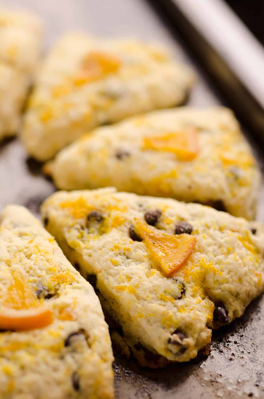 Dark Chocolate & Orange Scones are soft and tender cake-like treats with a bright citrus flavor paired with rich dark chocolate. Serve them for breakfast, brunch or dessert, they are sure to be a hit!