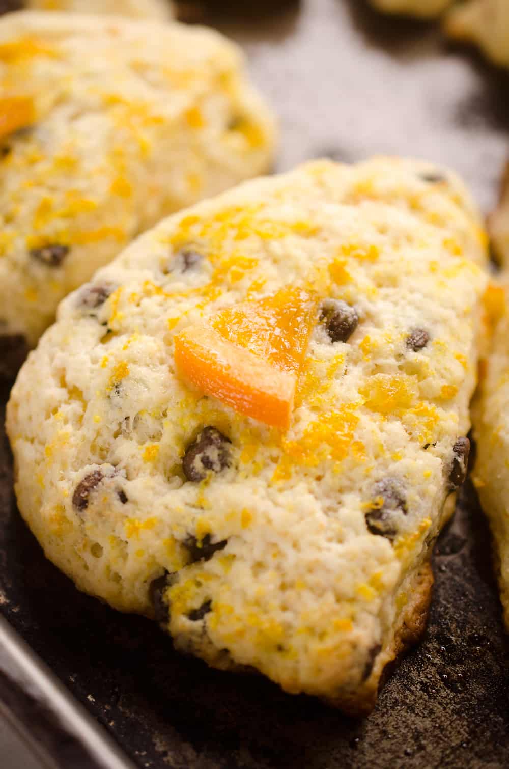 Dark Chocolate & Orange Scones are soft and tender cake-like treats with a bright citrus flavor paired with rich dark chocolate. Serve them for breakfast, brunch or dessert, they are sure to be a hit!