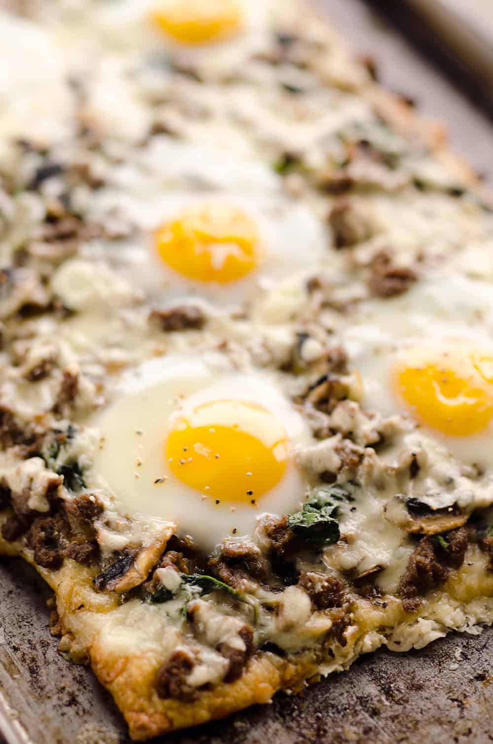 Turkey Sausage Breakfast Pizza is an easy recipe containing all of the best parts of breakfast! A flaky crescent crust is topped with a mixture of lean Jennie-O turkey sausage, vegetables, creamy Havarti cheese and soft baked eggs for a meal you won't soon forget. 