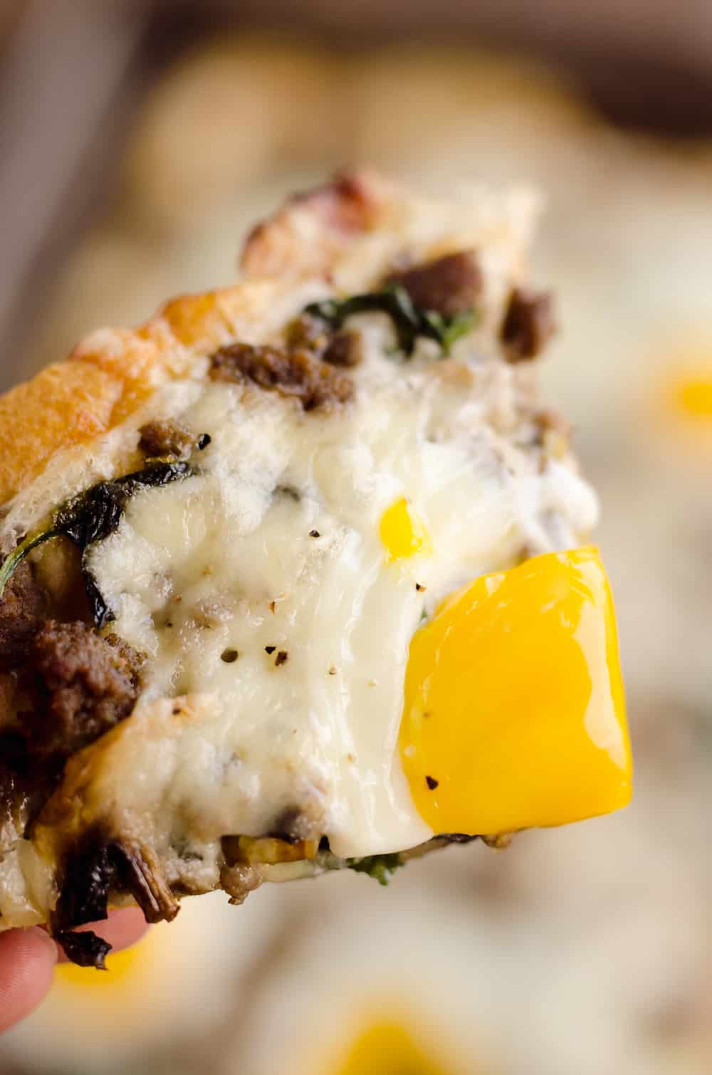 Turkey Sausage Breakfast Pizza is an easy recipe containing all of the best parts of breakfast! A flaky crescent crust is topped with a mixture of lean Jennie-O turkey sausage, vegetables, creamy Havarti cheese and soft baked eggs for a meal you won't soon forget. 