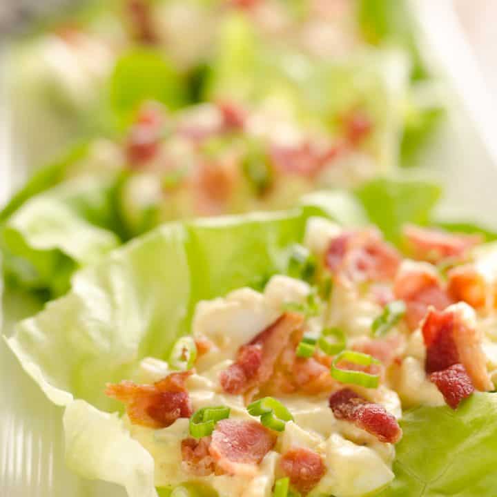 Light Bacon Egg Salad Lettuce Cups are an easy and healthy low-carb lunch idea made with Greek yogurt and topped with crispy bacon for amazing flavor!
