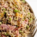 Roasted Pineapple & Ham Quinoa Salad is an easy recipe using up leftover ham with the perfect combination of sweet, salty and smokey flavors. Crunchy quinoa and oven roasted pineapple and ham are tossed with a Light Honey Dijon Vinaigrette for an easy 5 ingredient salad.