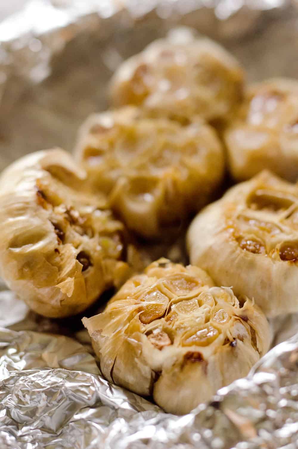 Learn How to Make Roasted Garlic, which is an easy way to add a huge burst of flavor to any dish!