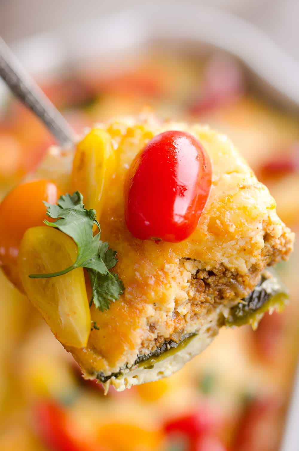 Roasted Poblano & Chorizo Egg Casserole is a low-carb breakfast recipe perfect for brunch or dinner! Fire roasted peppers are layered with spicy Chorizo and Mexican cheeses for a healthy egg bake bursting with bold flavors. 