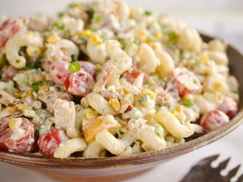 Creamy Turkey Cobb Pasta Salad is a fresh and flavorful side dish perfect for your next picnic or potluck. Pasta, Jennie-O turkey breast, bacon, bleu cheese and veggies are tossed in a zesty avocado sauce for a salad bursting with flavor and crunch.