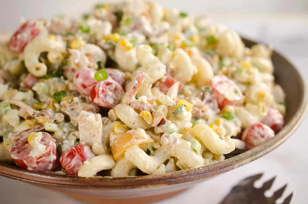 Creamy Turkey Cobb Pasta Salad is a fresh and flavorful side dish perfect for your next picnic or potluck. Pasta, Jennie-O turkey breast, bacon, bleu cheese and veggies are tossed in a zesty avocado sauce for a salad bursting with flavor and crunch. 