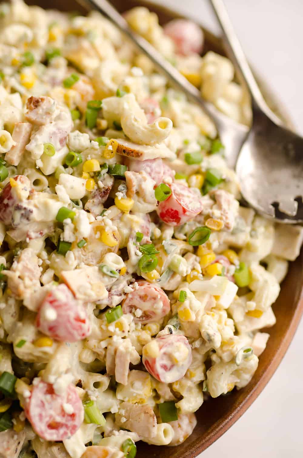 Creamy Turkey Cobb Pasta Salad is a fresh and flavorful side dish perfect for your next picnic or potluck. Pasta, Jennie-O turkey breast, bacon, bleu cheese and veggies are tossed in a zesty avocado sauce for a salad bursting with flavor and crunch.