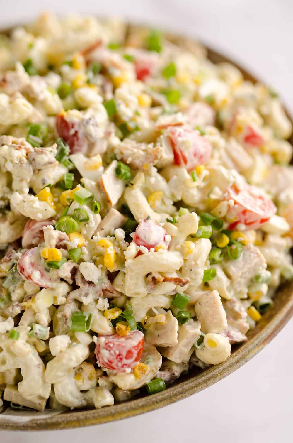Creamy Turkey Cobb Pasta Salad is a fresh and flavorful side dish perfect for your next picnic or potluck. Pasta, Jennie-O turkey breast, bacon, bleu cheese and veggies are tossed in a zesty avocado sauce for a salad bursting with flavor and crunch. 