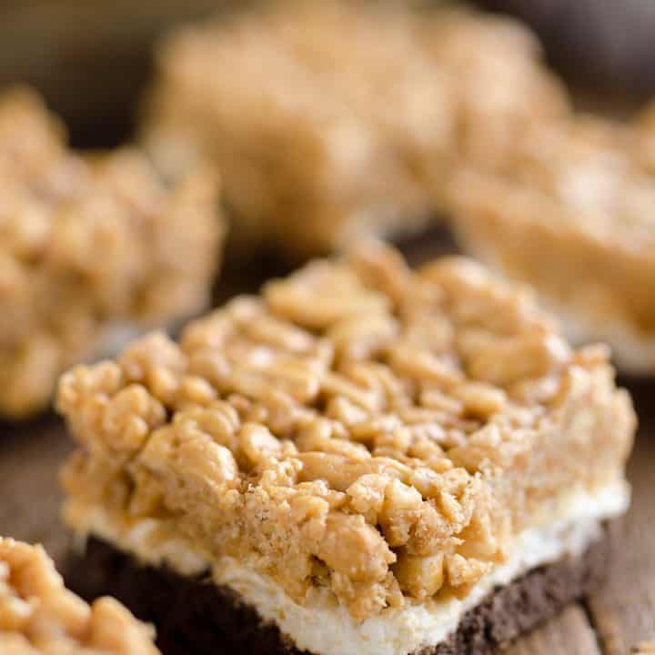 Crunchy Peanut Butter Marshmallow Bars are a sweet and salty dessert everyone will love! A chocolate crust is topped with marshmallows and a crunchy peanut butter and rice crispie mixture for a delicious treat.