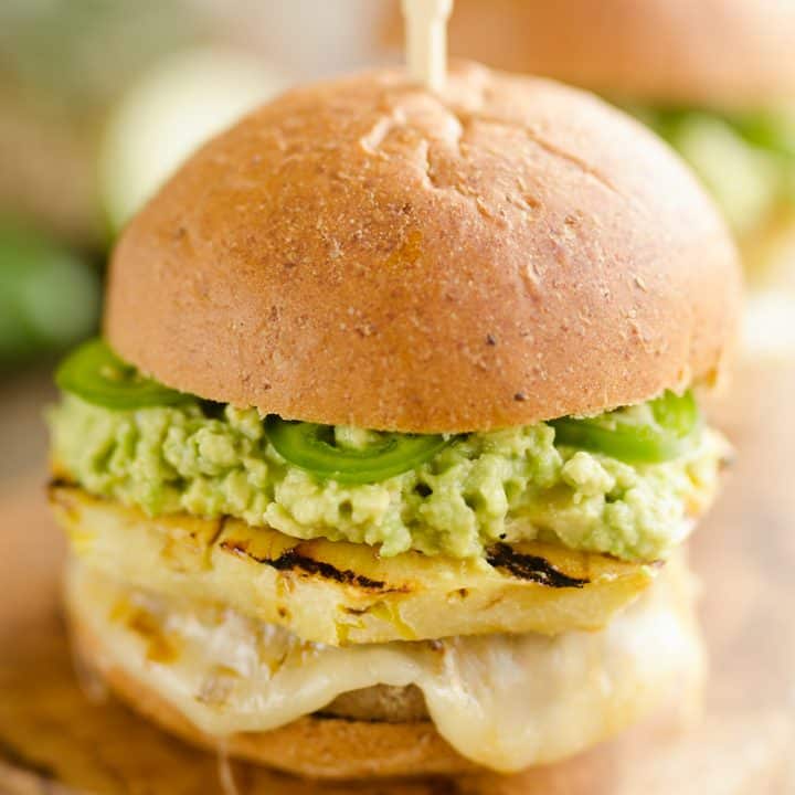 Grilled Pineapple & Guacamole Turkey Burger is a healthy and easy recipe made on the grill! Juicy Jennie-O Turkey Burgers are topped with pepperjack cheese, sweet grilled pineapple, guacamole and fresh jalapeños for a zesty burger perfect for any grill out. 