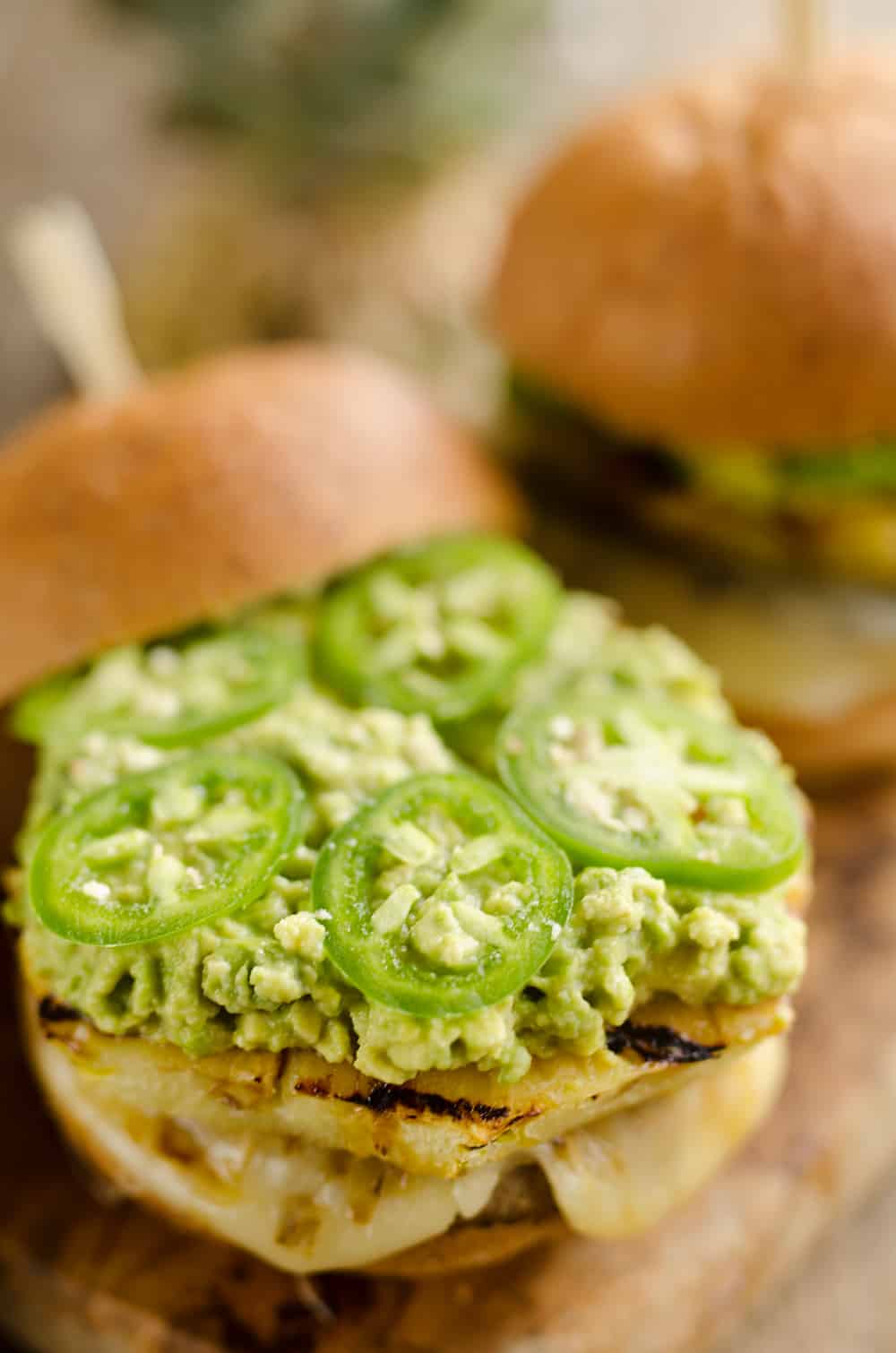 Grilled Pineapple & Guacamole Turkey Burger is a healthy and easy recipe made on the grill! Juicy Jennie-O Turkey Burgers are topped with pepperjack cheese, sweet grilled pineapple, guacamole and fresh jalapeños for a zesty burger perfect for any grill out. 