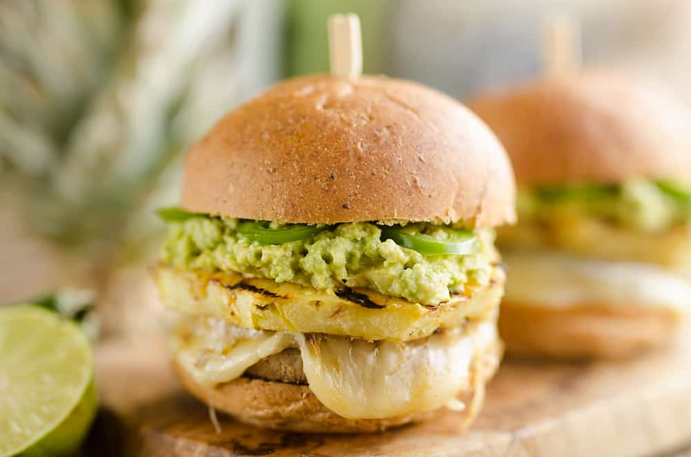 Grilled Pineapple & Guacamole Turkey Burger is a healthy and easy recipe made on the grill! Juicy Jennie-O Turkey Burgers are topped with pepperjack cheese, sweet grilled pineapple, guacamole and fresh jalapeños for a zesty burger perfect for any grill out. 