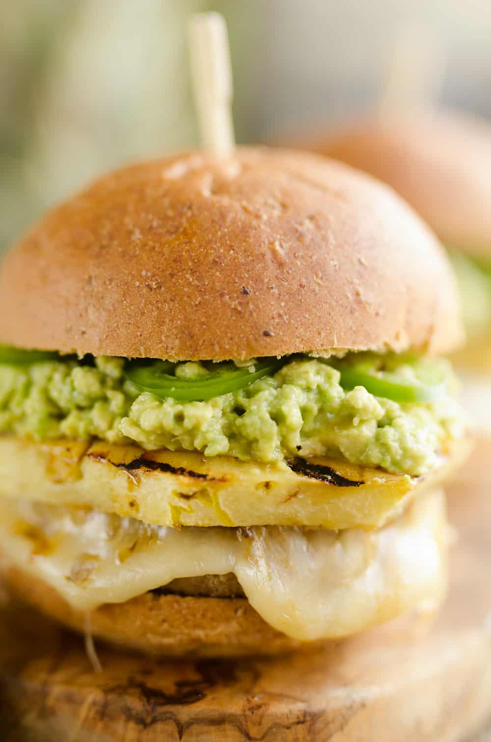 Grilled Pineapple & Guacamole Turkey Burger is a healthy and easy recipe made on the grill! Juicy Jennie-O Turkey Burgers are topped with pepperjack cheese, sweet grilled pineapple, guacamole and fresh jalapeños for a zesty burger perfect for any grill out. 