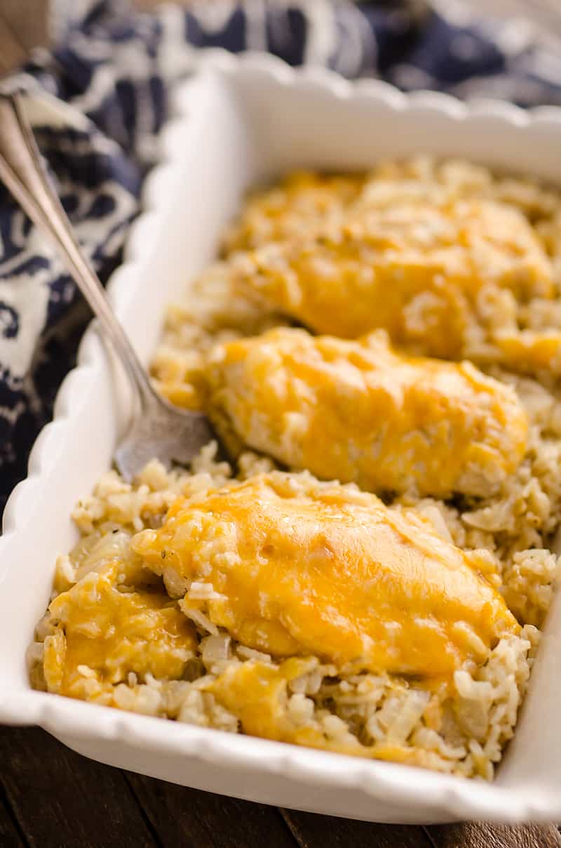 Pressure Cooker Salsa Verde Chicken & Rice is a quick and easy dinner recipe made in your Instant Pot in less than 30 minutes! Zesty rice is topped with cheesy chicken breasts for a one-pot meal the whole family will love.