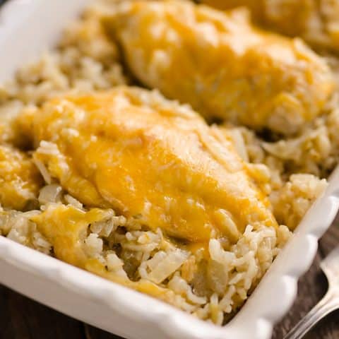 Pressure Cooker Salsa Verde Chicken & Rice is a quick and easy dinner recipe made in your Instant Pot in less than 30 minutes! Zesty rice is topped with cheesy chicken breasts for a one-pot meal the whole family will love.
