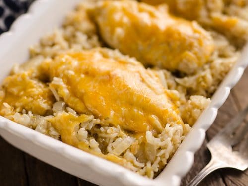 Pressure Cooker Salsa Verde Chicken & Rice is a quick and easy dinner recipe made in your Instant Pot in less than 30 minutes! Zesty rice is topped with cheesy chicken breasts for a one-pot meal the whole family will love.