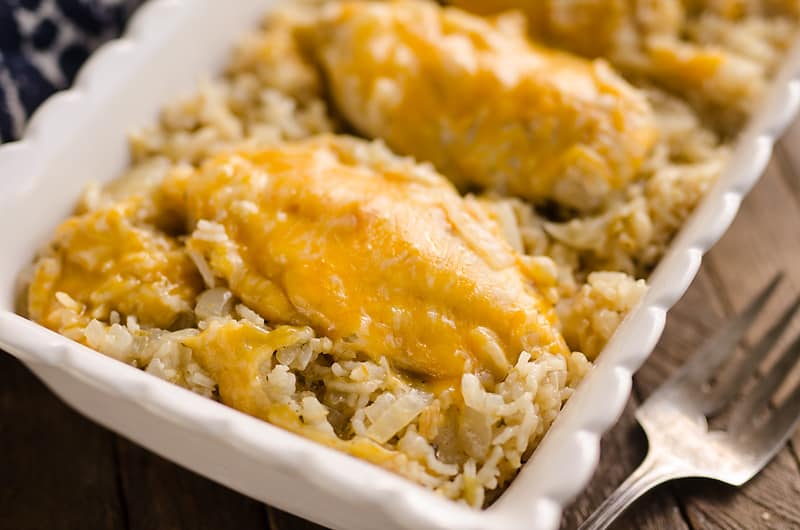 Pressure Cooker Salsa Verde Chicken & Rice is a quick and easy dinner recipe made in your Instant Pot in less than 30 minutes! Zesty rice is topped with cheesy chicken breasts for a one-pot meal the whole family will love.