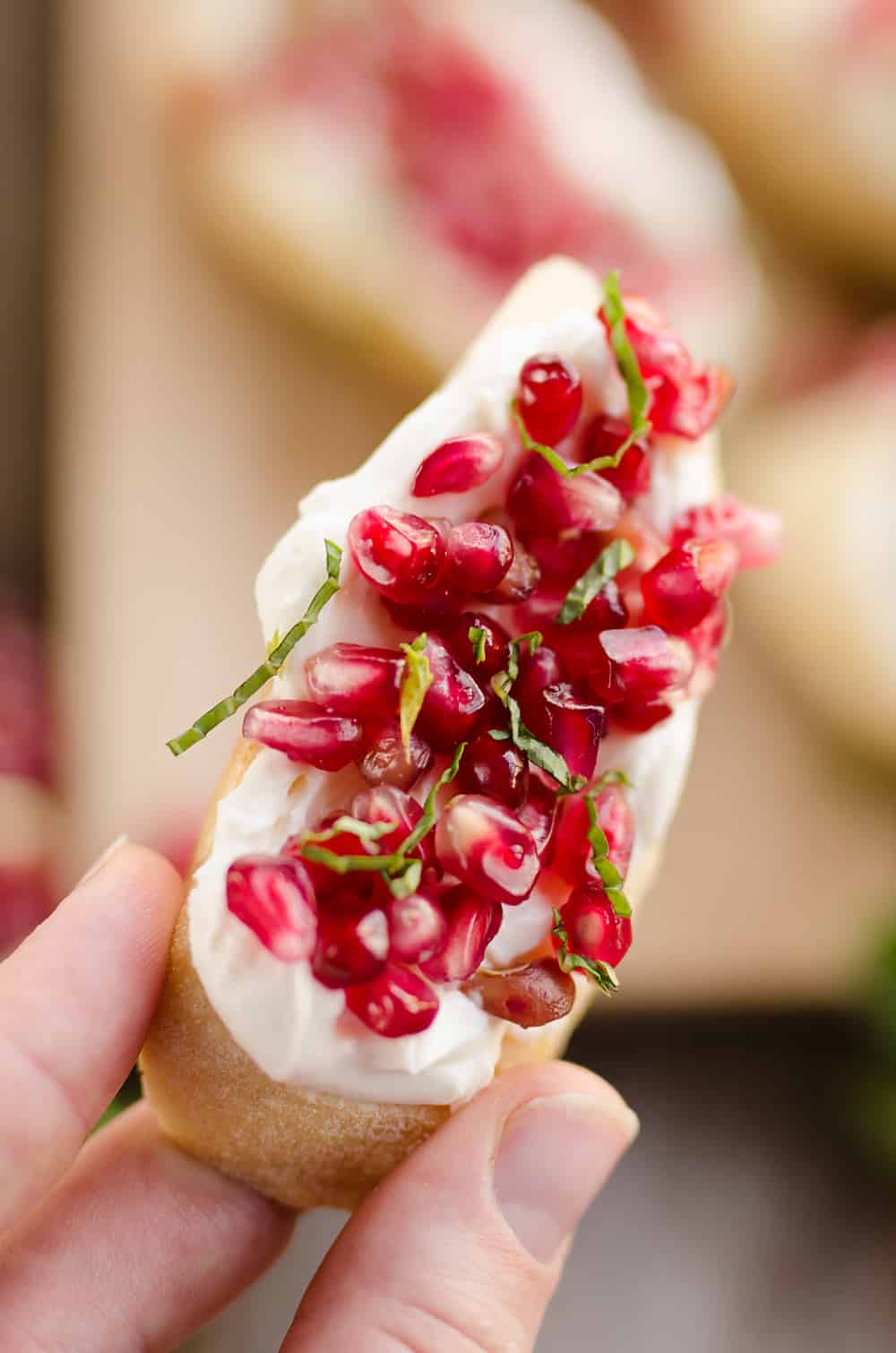 Pomegranate Goat Cheese Crostini being served