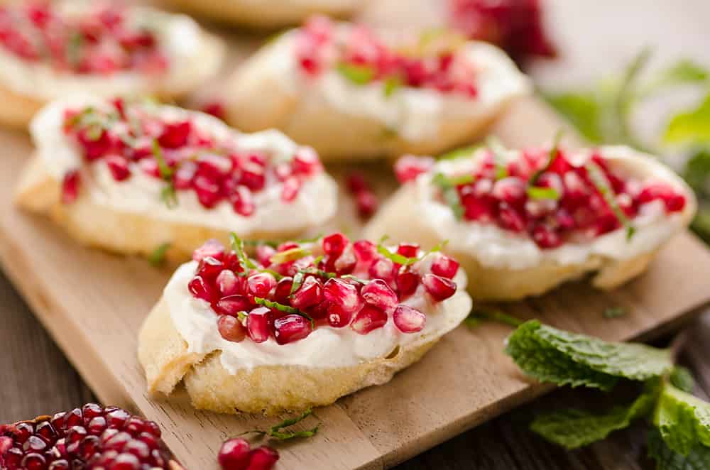 Pomegranate Goat Cheese Crostini plated