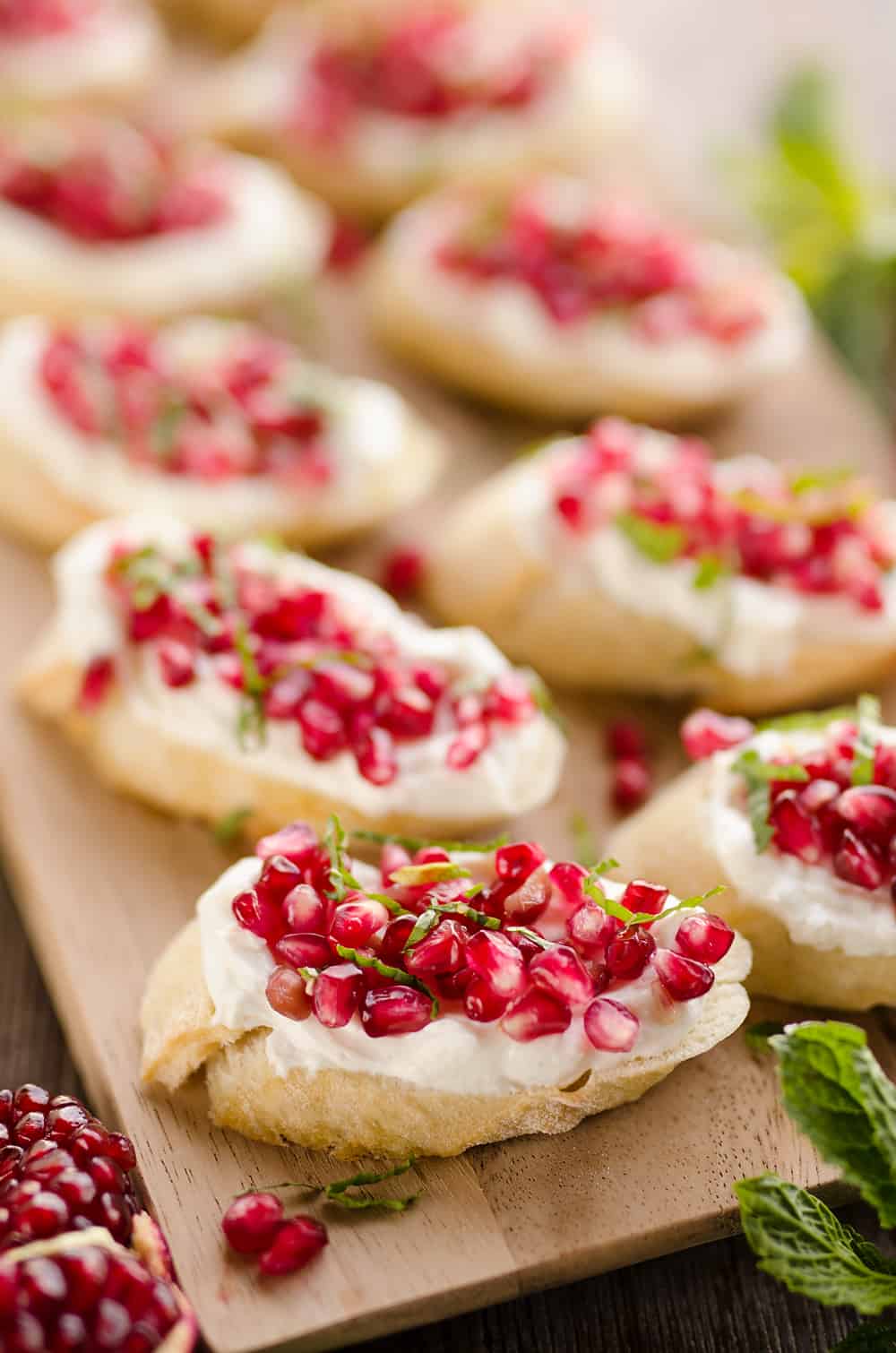 Pomegranate Goat Cheese Crostini served on platter