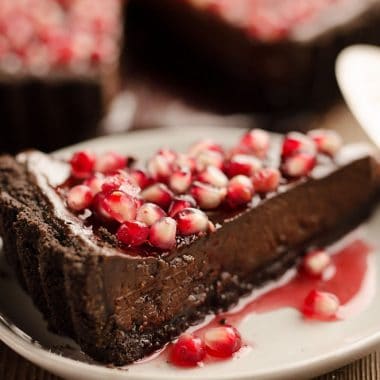 Salted Dark Chocolate Pomegranate Tart slice