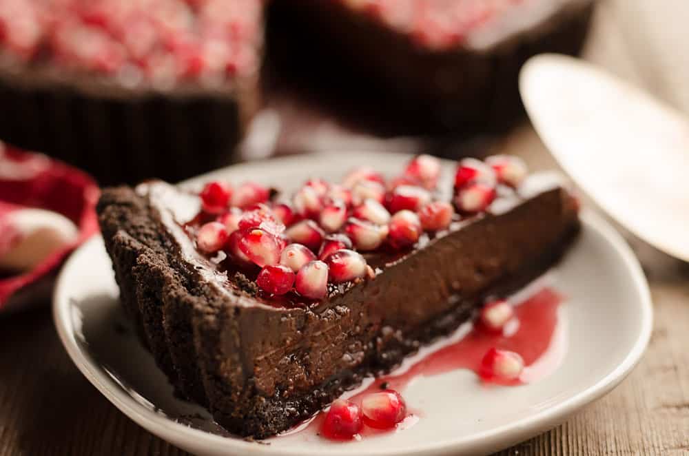 Salted Dark Chocolate Pomegranate Tart slice