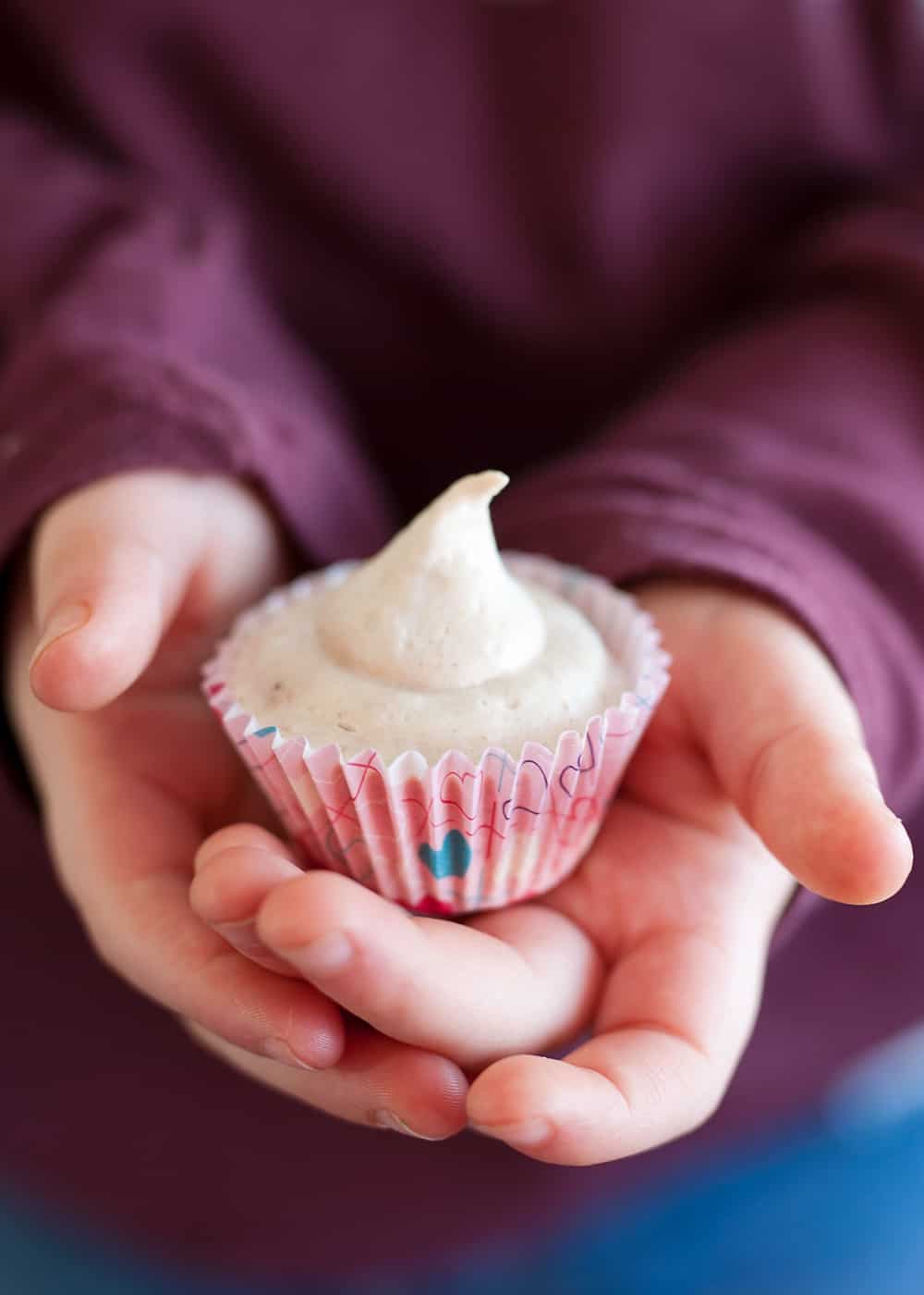 Frozen Peanut Butter Banana Bites held in kids hands