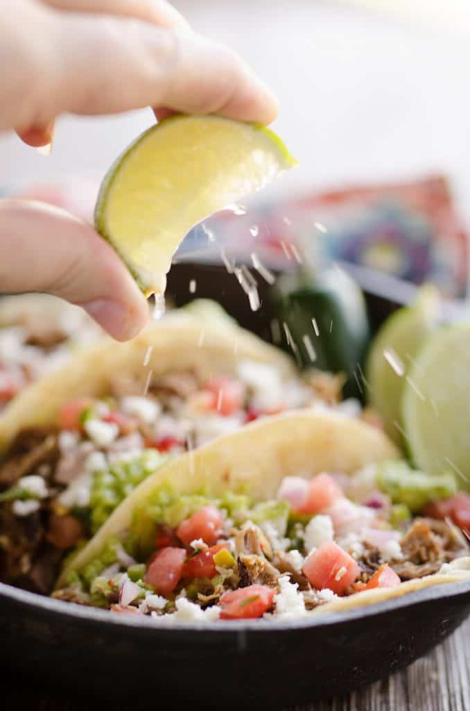 Pork Carnitas Street Tacos with squeeze of lime wedge