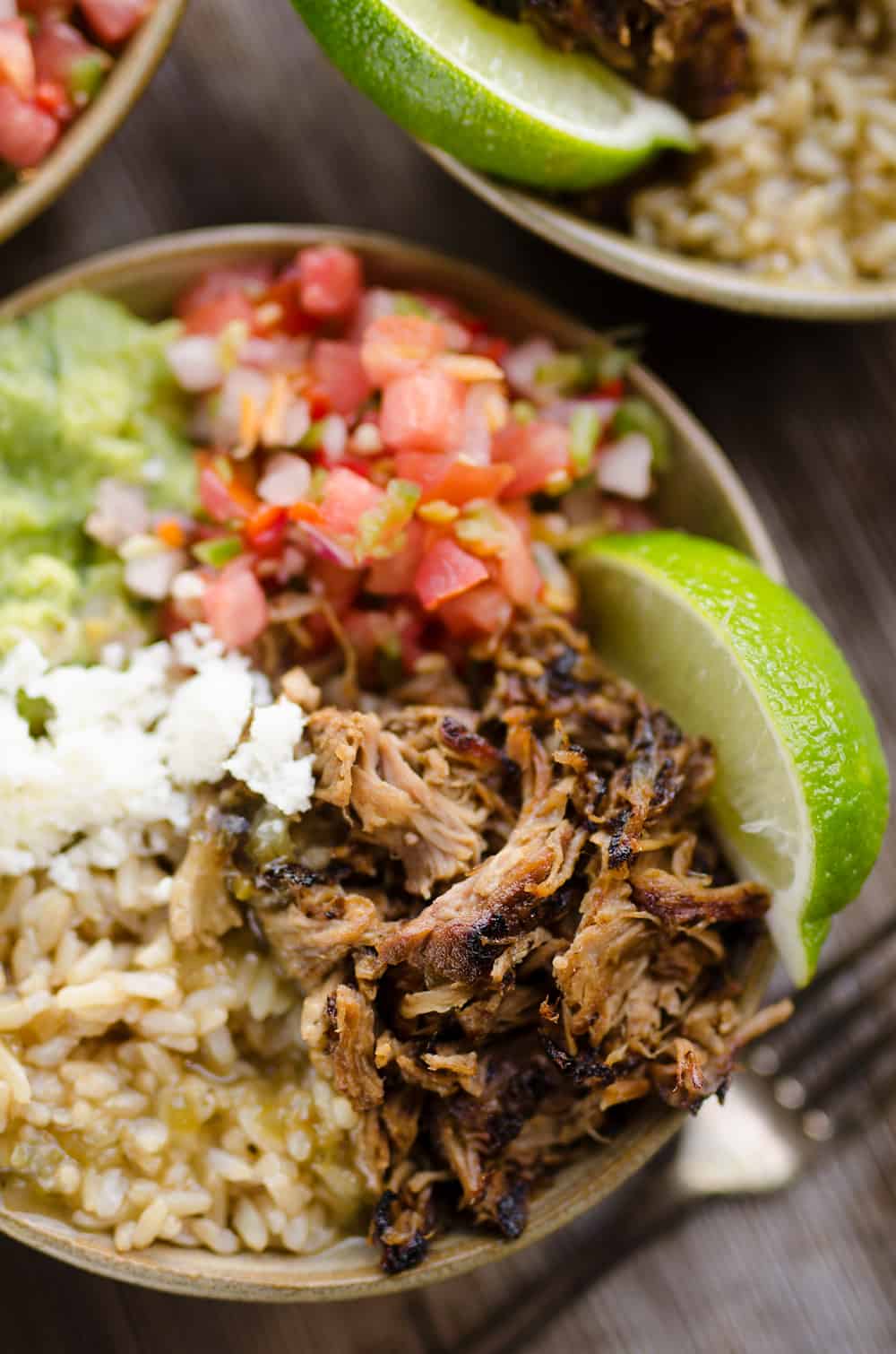 Easy Pork Carnitas Rice Bowls in serving bowl